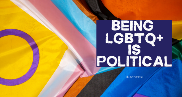 Being LGBTQ+ Is Political - words on an inclusive pride flag